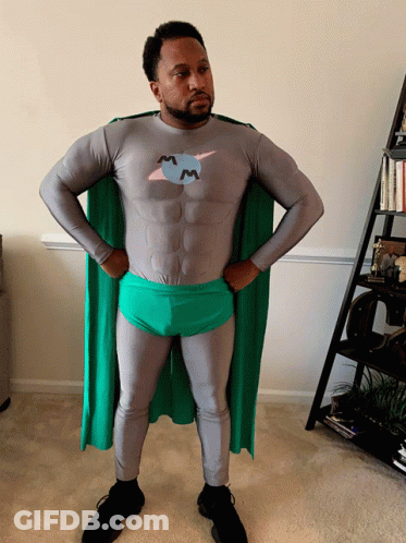 Man In Superhero Costume With M On Chest GIF