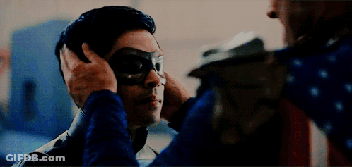 Man In Superhero Costume With Mask GIF