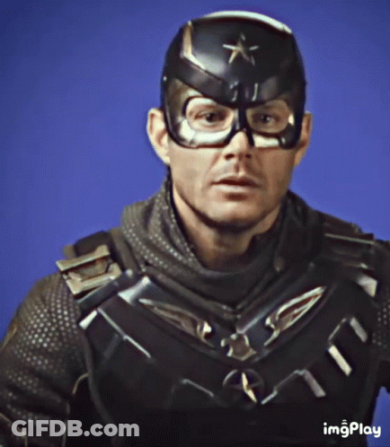 Man In Superhero Costume With Star Helmet GIF