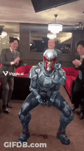 Man In Superhero Suit Dancing GIF