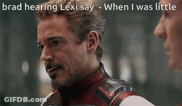 Man In Superhero Suit Talking To Another Man GIF