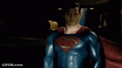 Man In Superman Costume And Red Cape GIF