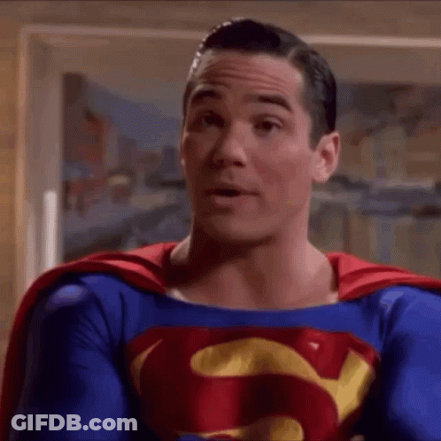 Man In Superman Costume Close Up GIF