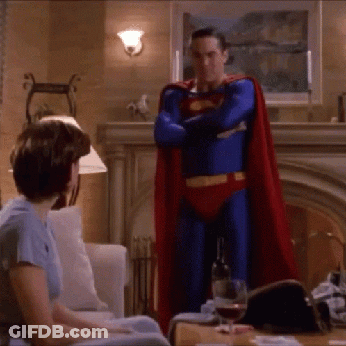 Man In Superman Costume Close Up GIF