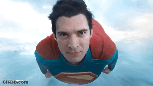 Man In Superman Costume Flying GIF
