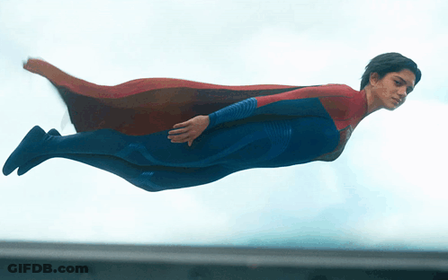 Man In Superman Costume Flying GIF