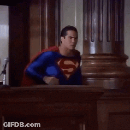 Man In Superman Costume In Courtroom GIF
