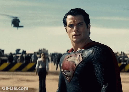 Man In Superman Costume In Desert GIF