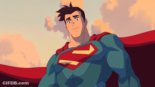 Man In Superman Costume In Front Of City GIF
