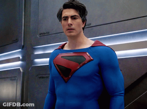 Man In Superman Costume In Front Of WB-047 GIF