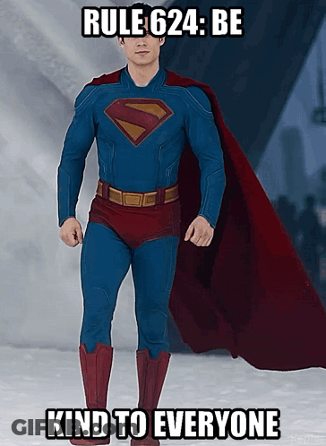 Man In Superman Costume Laying On Bed GIF