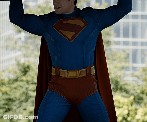 Man In Superman Costume Looking Down GIF