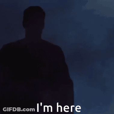 Man In Superman Costume Saying I'm Here GIF