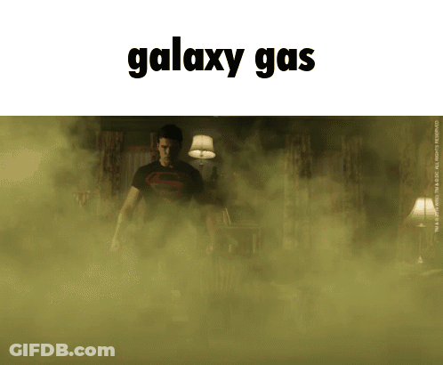 Man In Superman Shirt In Green Galaxy Gas GIF