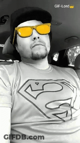 Man In Superman Shirt Sitting In Car GIF