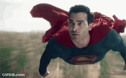 Man In Superman Suit Flying GIF