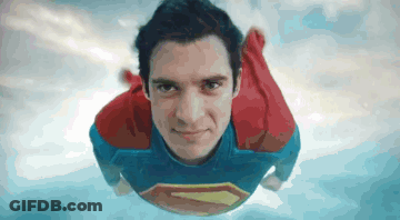 Man In Superman Suit Flying GIF
