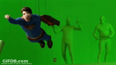 Man In Superman Suit Flying GIF