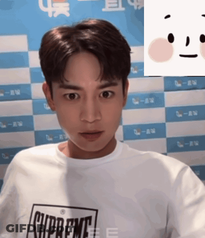 Man In Supreme Shirt Looking At Camera GIF