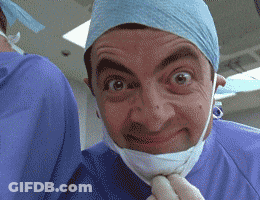 Man In Surgical Mask And Gloves Making Face GIF