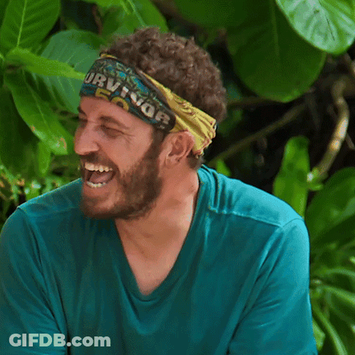 Man In Survivor Headband Laughing GIF