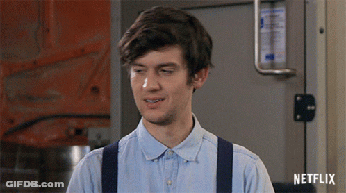 Man In Suspenders And Blue Shirt With Word Netflix GIF