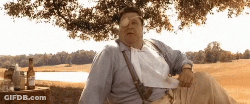 Man In Suspenders Sunglasses With Beer In Field GIF
