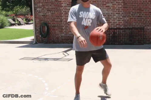 Man In Swan Air Shirt Dribbling Basketball GIF