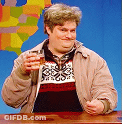 Man In Sweater And Jacket Holding Whiskey GIF