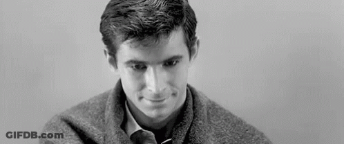 Man In Sweater And Tie Smiling GIF