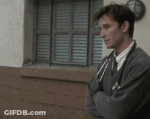 Man In Sweater And Tie With Stethoscope Arms Crossed GIF