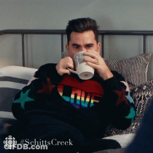 Man In Sweater Saying Love GIF