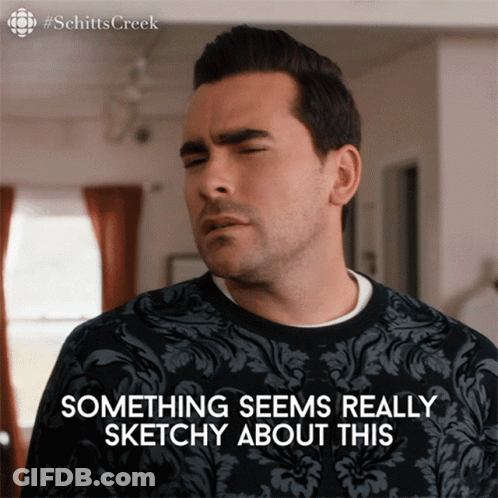 Man In Sweater Saying Something Sketchy GIF
