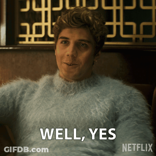 Man In Sweater Saying Well Yes GIF