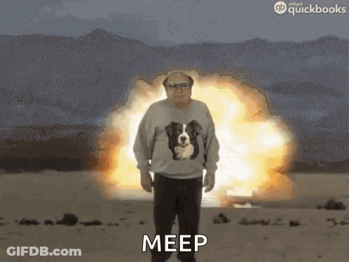Man In Sweater With Dog Says Meep Explosion GIF