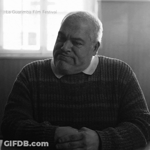 Man In Sweater With Folded Hands At La Guarimba GIF