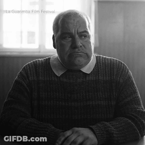 Man In Sweater With La Guarimba Film Festival Watermark GIF