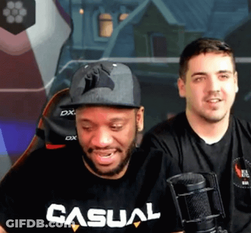 Man In T-Shirt Beside Man In Hat GIF