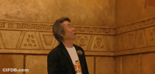 Man In T-Shirt Looking Up GIF