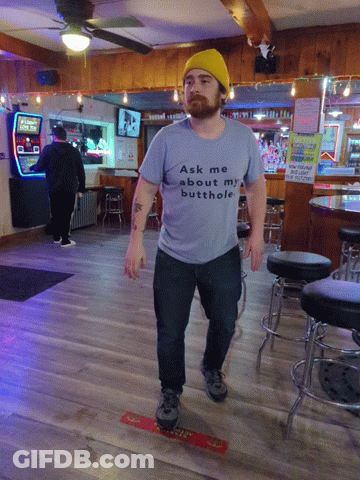 Man In T-Shirt Saying Ask Me About My Butthole GIF