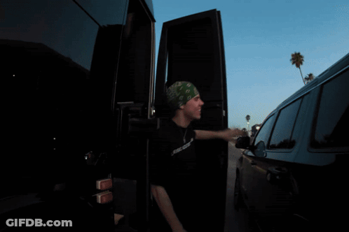 Man In T-Shirt Saying I Bring Acid Duty And Am GIF