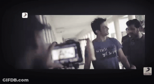 Man In T-Shirt Saying No Close Yes So Far GIF
