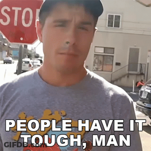 Man In T-Shirt Saying People Have It Tough GIF