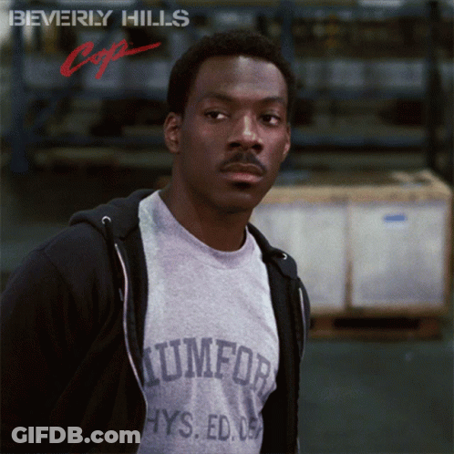 Man In T-Shirt Saying Triumph GIF