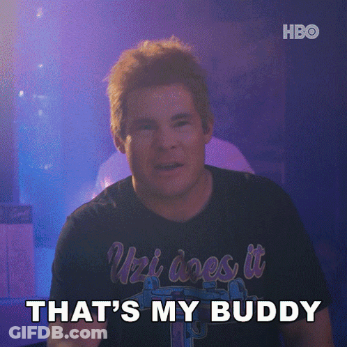 Man In T-Shirt Saying Uzi Does It That's My Buddy GIF