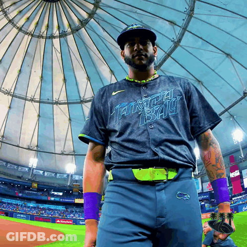 Man In Tampa Bay Jersey In Front Of Dome GIF