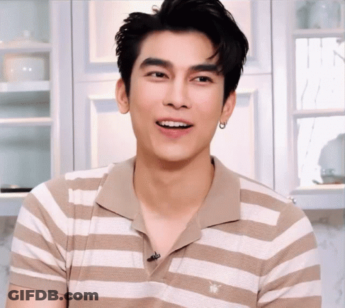 Man In Tan And White Striped Shirt With Bee GIF
