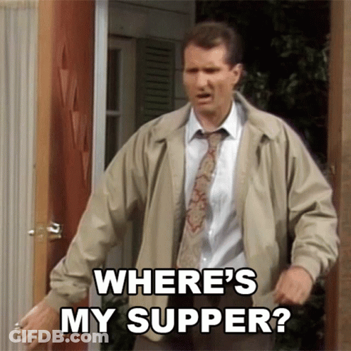 Man In Tan Jacket And Tie Asking Where's My Supper GIF