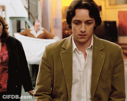 Man In Tan Jacket Walking GIF