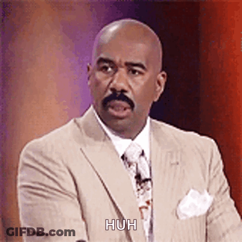 Man In Tan Suit Making Funny Face GIF